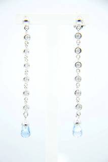 Earrings in chain composition with diamonds and aquamarine
