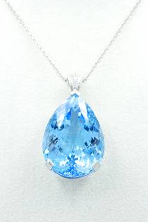 Necklace with blue topaz and diamonds