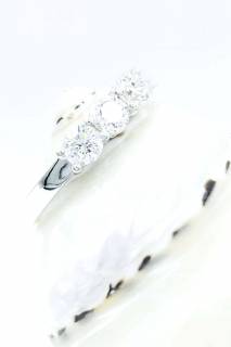 Ring with three diamonds in a row