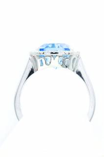Ring with blue topaz and diamonds