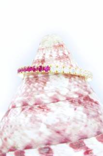 Eternity ring with rubies and diamonds