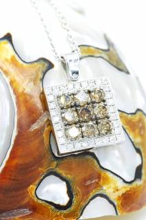 Pendant with brown and white diamonds in a square composition